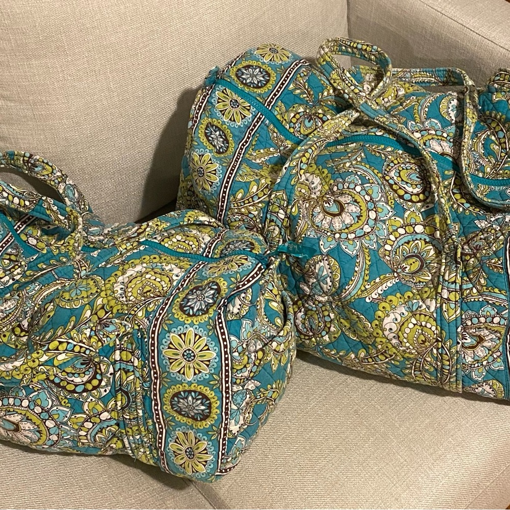 Set of two woven duffle bags